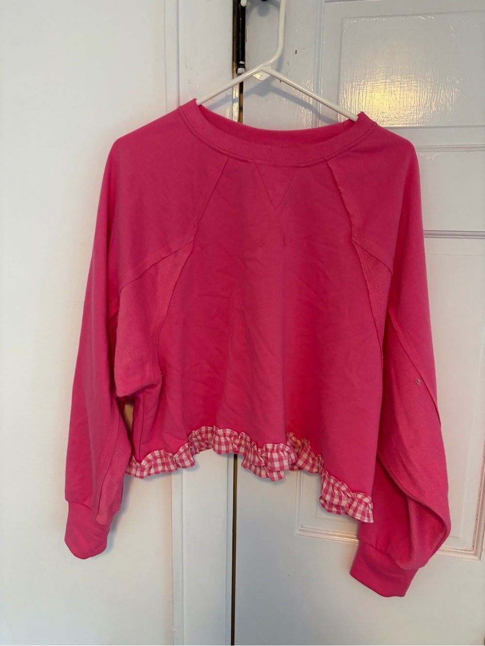 Pink Lily Women's Pink Ruffled Hem Sweatshirt